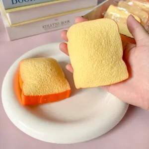 Macro view of a realistic sliced bread squishy toy showing its soft, textured surface