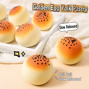 Close-up detail of realistic egg yolk pastry squishy toy with slow rebound texture