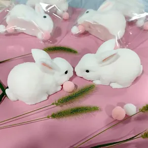 Close-up detail of adorable white fluffy rabbit squishy toy for stress relief
