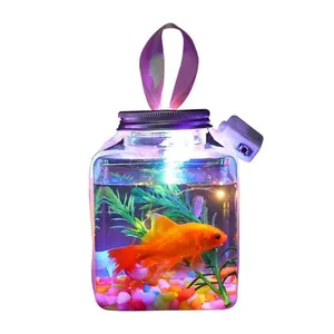 Detalle de tarro de peces luminoso portátil con luz LED y piedras de colores