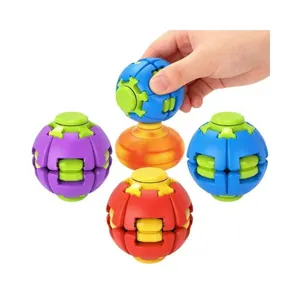 Detailed close-up showing colorful 3D printed fidget spinner balls in hand-spun motion