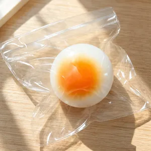 Realistic food-grade poached egg squishy toy made of slow rebound TPR stress relief material