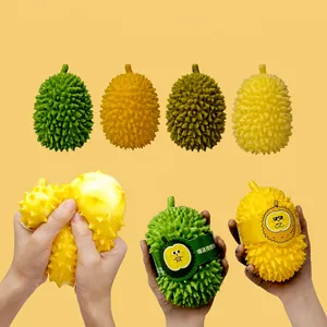 Close-up of flexible durian-shaped squishy toys being stretched and squeezed for stress relief.