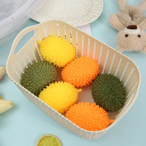 Close-up detail of colorful durian-shaped stress relief squeeze toys inside a cream basket