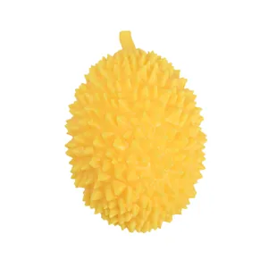 Realistic yellow durian squishy stress relief toy for kids and adults on white background.