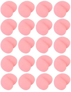 Detailed grid view of multiple soft pink peach butt squishy toy phone accessories