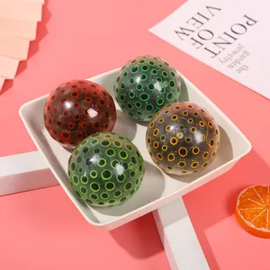Lot de quatre balles anti-stress en TPR colorées pour presser et se détendre au sensoriel