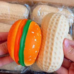 Macro detail of realistic peanut and colorful burger squishy toys for stress relief