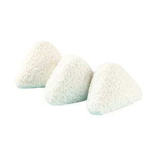 Detailed view of three white squishy rice ball toys for stress relief with rice texture