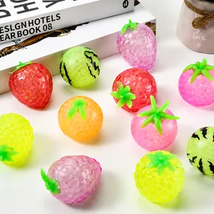 Macro view of various colorful fruit-shaped bead stress relief squeeze toys for kids