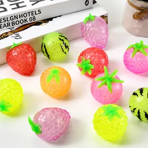 Macro view of various colorful fruit-shaped bead stress relief squeeze toys for kids