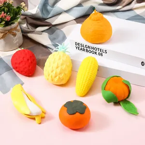 Detailed view of various colorful fruit and vegetable shaped squeeze stress relief toys