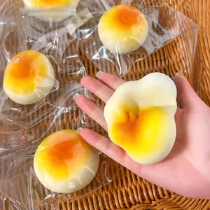 Stress relief squeeze toy shaped like a realistic soy milk bun, soft TPR slow rebound squishy.