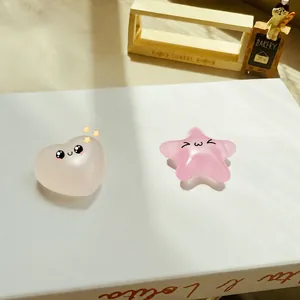 Detailed view of heart and star-shaped color-changing squishy stress relief toys