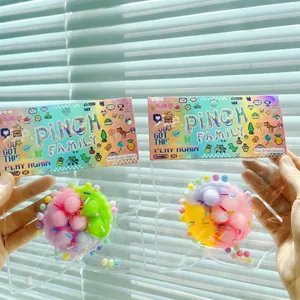 Close-up of colorful raspberry tart squeeze toys in their original transparent packaging