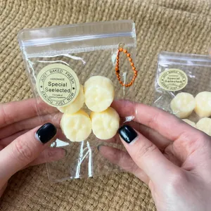 Handheld bag of four realistic mini fruit squishies for decompression and sensory play