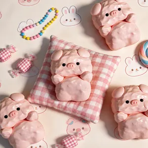 Close-up of pink pig silicone squishy toy with unique textured finish