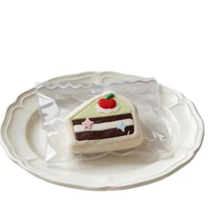Realistisches Erdbeerkuchen-Silikon-Squishy-Spielzeug zur Stressbewältigung in Tüte