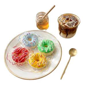 Jouets squishy en silicone colorés en forme de donut pour soulager le stress.