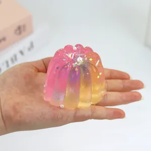 Colorful transparent pudding squeeze toy with glitter and pearls for stress relief