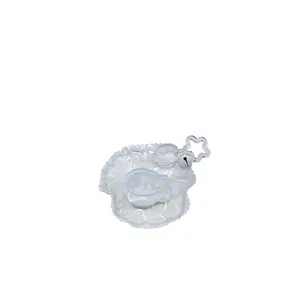 Transparent fish-shaped silicone squishy toy with star keychain for stress relief.