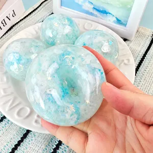 Close-up detail of handmade sky blue silicone squishy crystal balls for stress relief