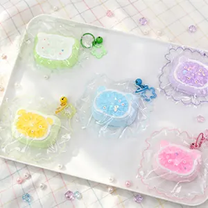 Detailansicht von fünf bunten Jelly Cat Head Squishy Toys mit sternförmigen Schlüsselanhängern