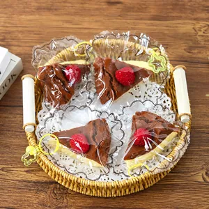 Realistic chocolate strawberry cake slice squishy toy with star keychain in a basket