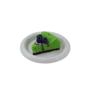 Realistic green blueberry cake squishy toy made of food-grade silicone for stress relief