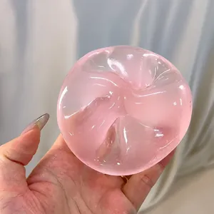 Hochwertiges, rosa-transparentes Maltose-Knautschspielzeug in weicher Baozi-Form