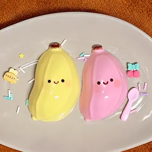 Cute simulation banana squishy toy with smiling face for stress relief and sensory play