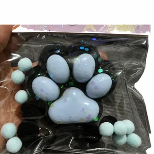 Grande giocattolo squishy zampa di gatto con cuscinetti blu e glitter antistress