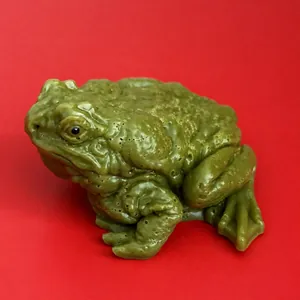 Close-up detail of a realistic green toad squeeze toy for stress relief and venting