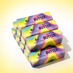 Stack of realistic rainbow-colored slow rebound squishy butter sticks for stress relief.