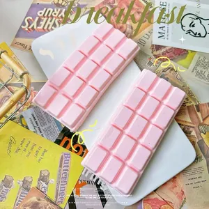Close-up of pink chocolate bar squishy toy with slow-rising texture for stress relief