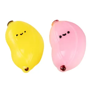 Pair of cute yellow and pink banana squishy toys for stress relief and fun sensory play.