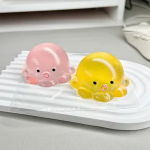 Creative pink and yellow octopus squishy stress relief toys featuring soft jelly texture