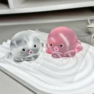 Pair of cute translucent octopus squishy toys for stress relief in pink and grey color