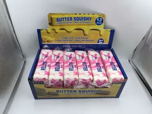 Detalle de un juego de doce piezas de juguetes butter squishy en caja de exhibición