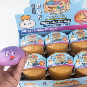 Ensemble de jouets sensoriels squishy bun en PU à rebond lent dans un panier vapeur