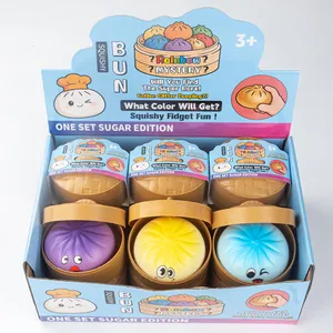 Set de jouets fidget dumplings squishy colorés dans une boîte de présentation panier