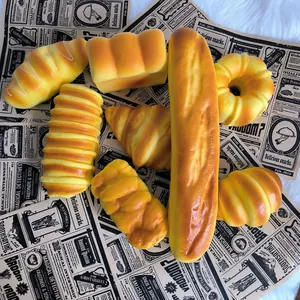 Detailed view of assorted PU slow rebound artificial bread with realistic golden texture