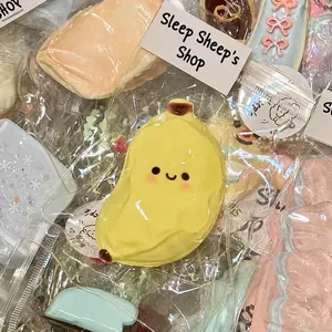 Schattig geel banaanvormig langzaam terugverend squishy speelgoed voor stressverlichting