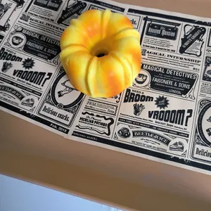 Detailed macro view of a yellow bundt cake shaped slow-rebound PU squishy toy.