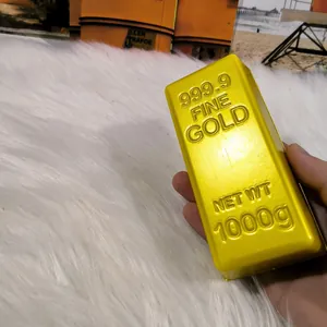 Detailaufnahme eines Goldbarren-Squishy-Spielzeugs mit 999,9 Fine Gold Prägung