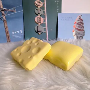 Close-up of yellow cheese and toast squishy slow rebound stress relief toys