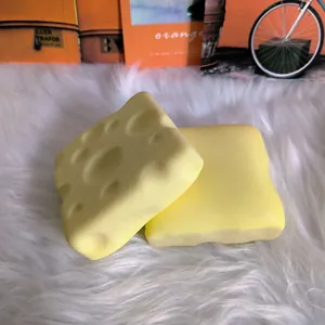 Close-up of yellow cheese and toast shaped slow rebound squishy stress relief toys