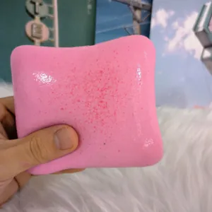 Detail of a soft pink cheese toast squishy toy for stress relief with slow rebound texture