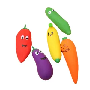 Set of five colorful cartoon vegetable TPR squeeze toys including carrot and eggplant