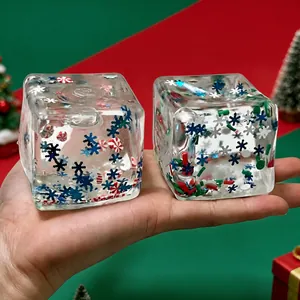 Festive Christmas-themed square squishy stress relief toy with snowflake fillings